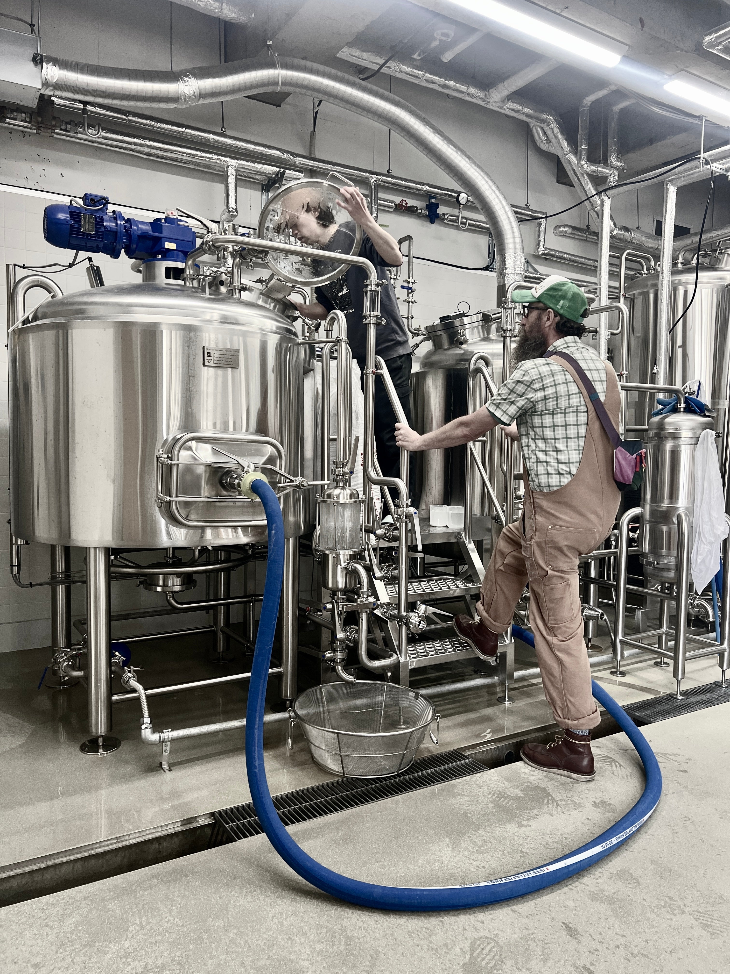 Sailors Grave Brewing Chris and Falo Brewing Naru Handa working together
at Falo Brewing